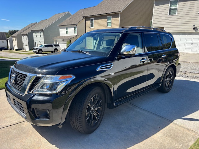 Used 2020 Nissan Armada Platinum w/ Captain's Chairs Package RWD image 1