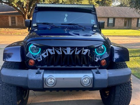Used 2012 Jeep Wrangler Unlimited Sport AWD/4WD image 1