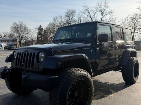 Used 2014 Jeep Wrangler Unlimited Sahara image 1