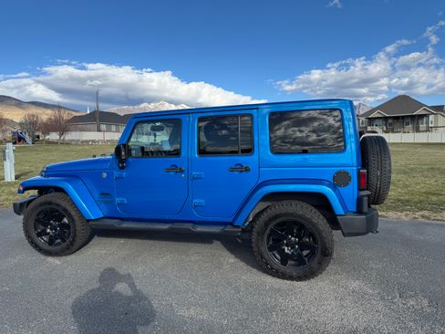 Used 2014 Jeep Wrangler Unlimited Sahara w/ Dual Top Group image 2
