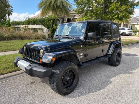 Used 2013 Jeep Wrangler Unlimited Sahara image 1