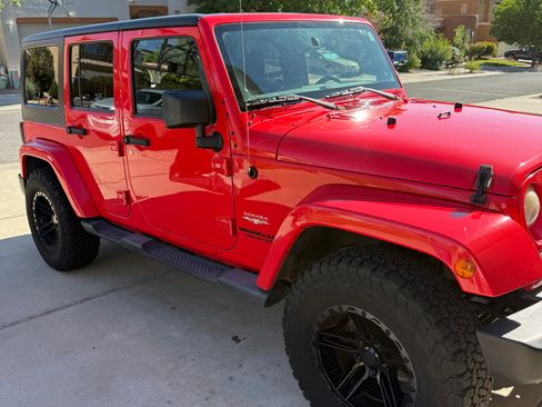 Used 2013 Jeep Wrangler Unlimited Sahara AWD/4WD image 1