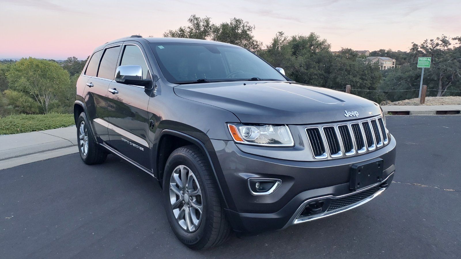 Used 2014 Jeep Grand Cherokee Limited AWD/4WD image 1