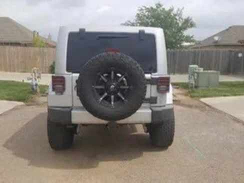 Used 2012 Jeep Wrangler Unlimited Sahara w/ Dual Top Group image 9