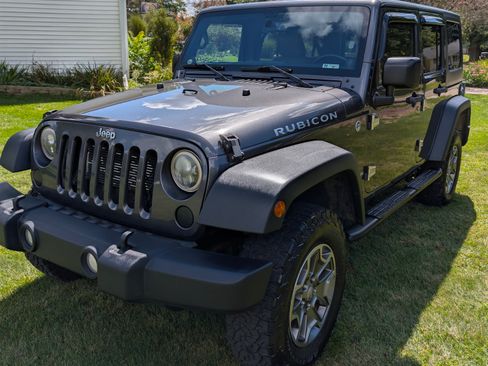 Used 2014 Jeep Wrangler Unlimited Rubicon w/ Dual Top Group image 2