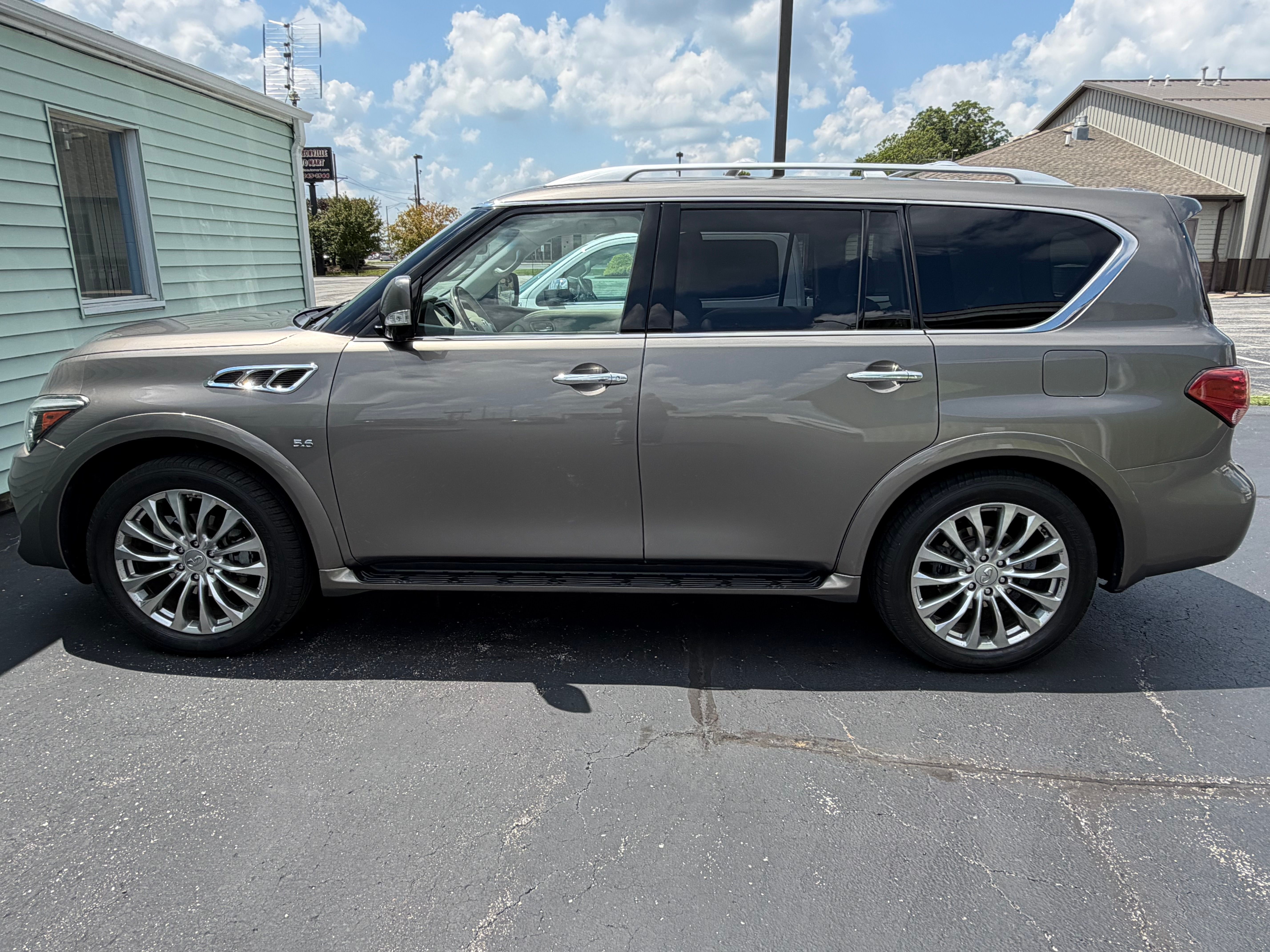Used 2015 INFINITI QX80 4WD w/ 22" Wheel Package image 1