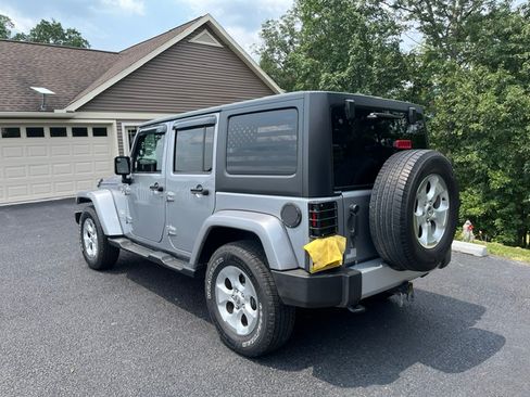 Used 2015 Jeep Wrangler Unlimited Sahara w/ Connectivity Group AWD/4WD image 1