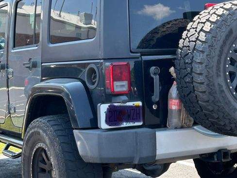 Used 2014 Jeep Wrangler Unlimited Sahara w/ Max Tow Package AWD/4WD image 8