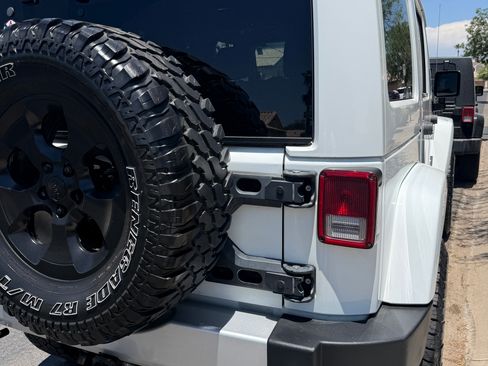 Used 2014 Jeep Wrangler Unlimited Sahara w/ Mopar Chrome Edition Group AWD/4WD image 5