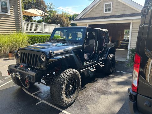 Used 2014 Jeep Wrangler Unlimited Sport AWD/4WD image 1