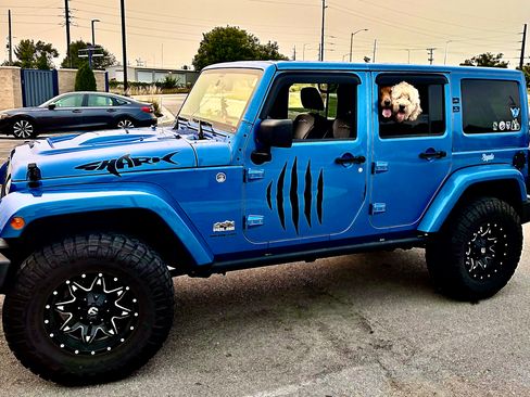 Used 2014 Jeep Wrangler Unlimited Sahara image 1