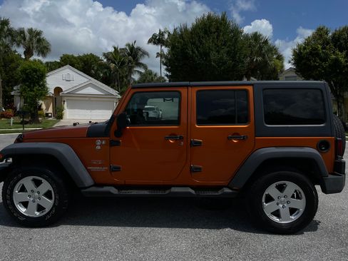 Used 2011 Jeep Wrangler Unlimited Sahara AWD/4WD image 1