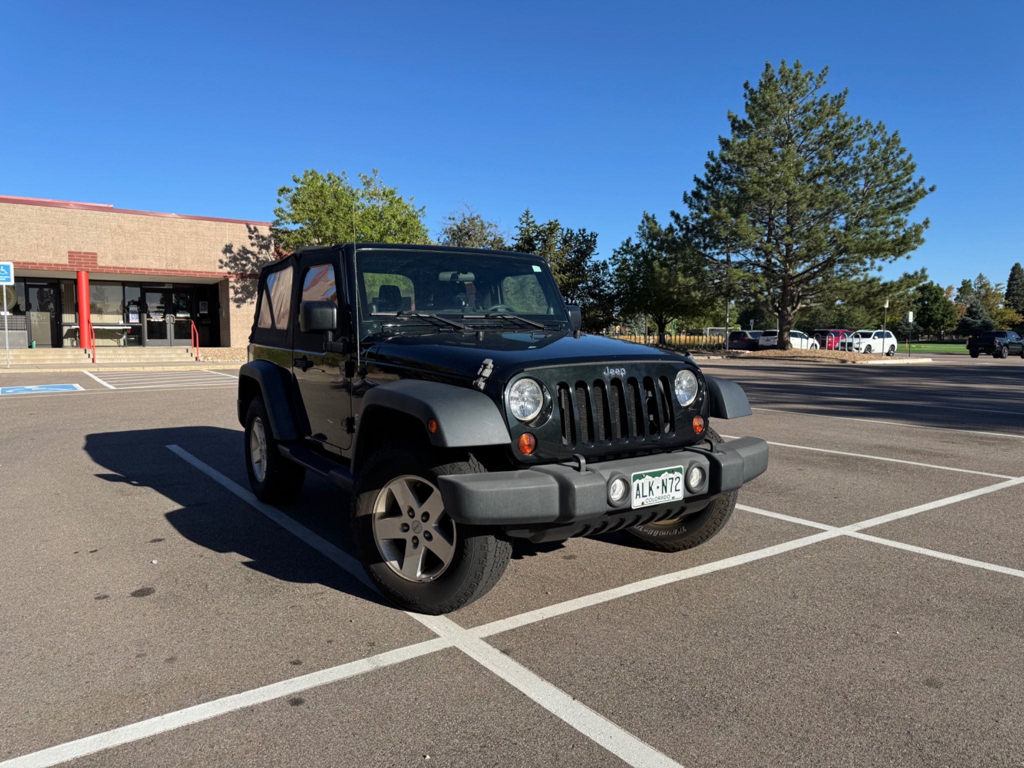 Used 2012 Jeep Wrangler Sport AWD/4WD image 1