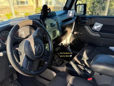 Used 2012 Jeep Wrangler Unlimited Sport w/ Black Appearance Group image 10