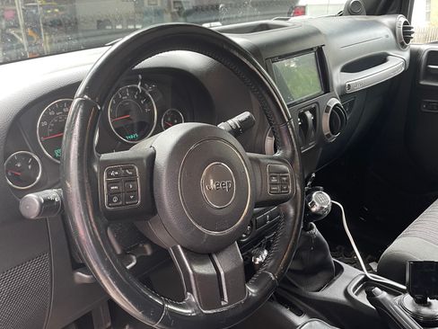 Used 2012 Jeep Wrangler Sport AWD/4WD image 1