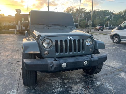 Used 2015 Jeep Wrangler Unlimited Sahara w/ Max Tow Package image 1