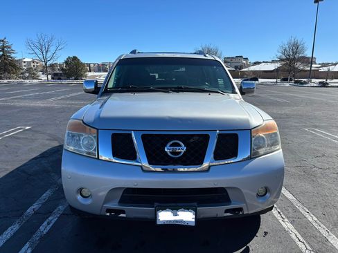 Used 2011 Nissan Armada Platinum w/ 2nd Row Captain Seat Pkg image 2
