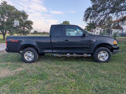 Used 1999 Ford F150 4x4 SuperCab image 1