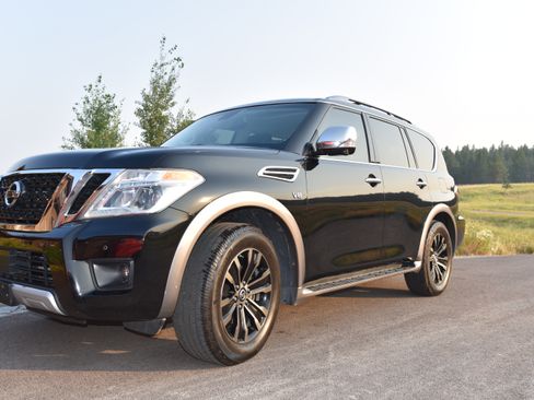 Used 2017 Nissan Armada Platinum w/ Captain Seat Package AWD/4WD image 1