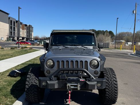 Used 2014 Jeep Wrangler Unlimited Sport image 2