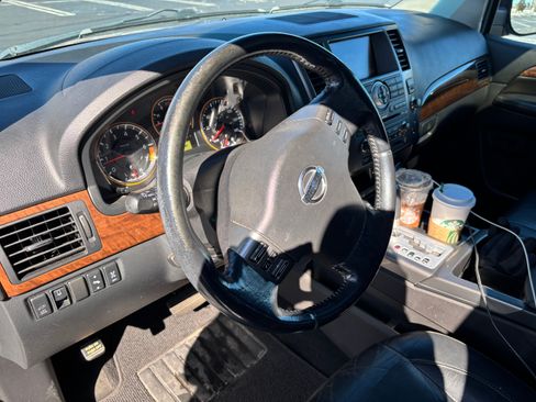 Used 2011 Nissan Armada Platinum w/ 2nd Row Captain Seat Pkg image 10