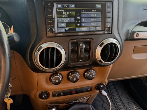Used 2013 Jeep Wrangler Unlimited Sahara w/ Mopar Chrome Edition Group AWD/4WD image 11