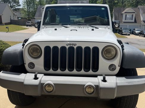 Used 2014 Jeep Wrangler Unlimited Sport w/ Max Tow Package AWD/4WD image 1