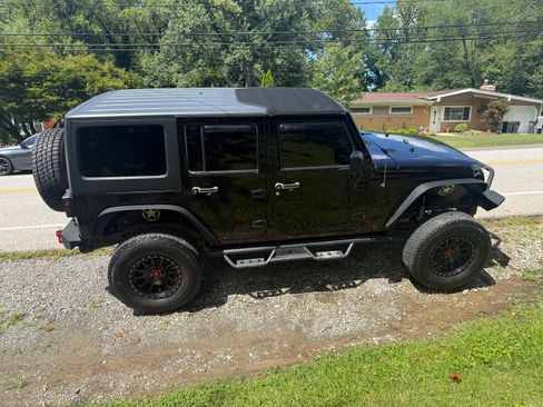Used 2011 Jeep Wrangler Unlimited Sport AWD/4WD image 8