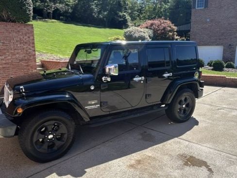 Used 2015 Jeep Wrangler Unlimited Sahara AWD/4WD image 1