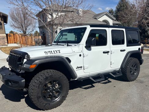 Used 2024 Jeep Wrangler Unlimited Sport image 1