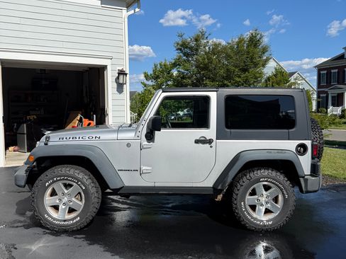 Used 2009 Jeep Wrangler Rubicon w/ Dual Top Group AWD/4WD image 1