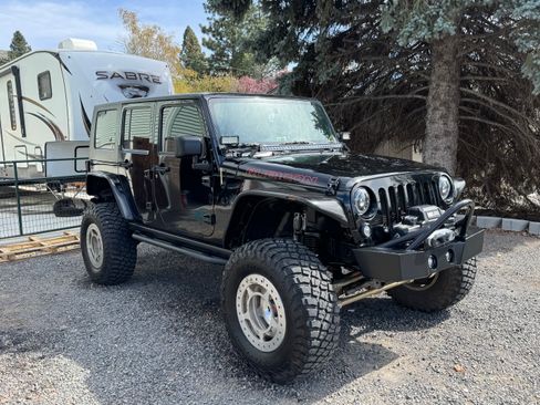 Used 2010 Jeep Wrangler Unlimited Rubicon w/ Dual Top Group AWD/4WD image 2