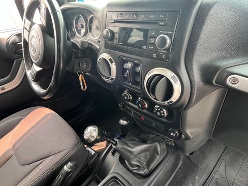 Used 2013 Jeep Wrangler Unlimited Sahara w/ Dual Top Group image 11