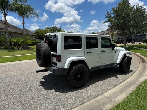 Used 2012 Jeep Wrangler Unlimited Sahara w/ Connectivity Group AWD/4WD image 2