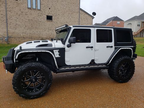 Used 2016 Jeep Wrangler Unlimited Sport AWD/4WD image 1
