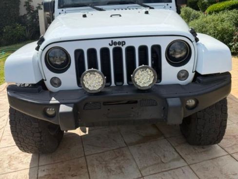 Used 2016 Jeep Wrangler Unlimited Sahara AWD/4WD image 4