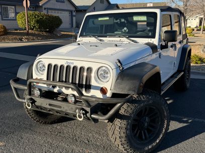 Used 2012 Jeep Wrangler Unlimited Sport w/ Black Appearance Group