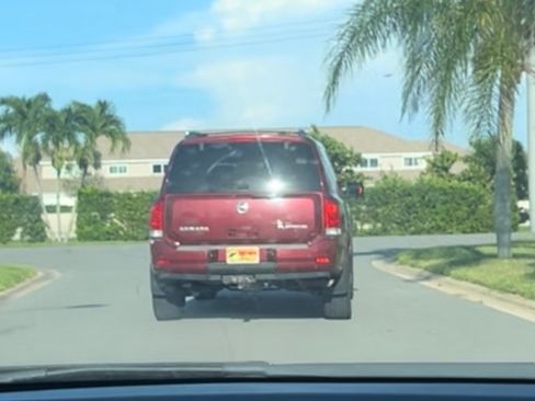 Used 2011 Nissan Armada Platinum w/ 2nd Row Captain Seat Pkg image 3