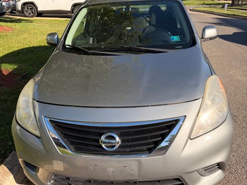 Used 2013 Nissan Versa SV FWD image 1