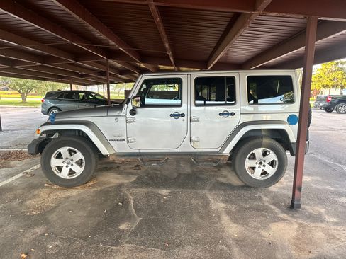 Used 2012 Jeep Wrangler Unlimited Sahara w/ Mopar Chrome Edition Group AWD/4WD image 2