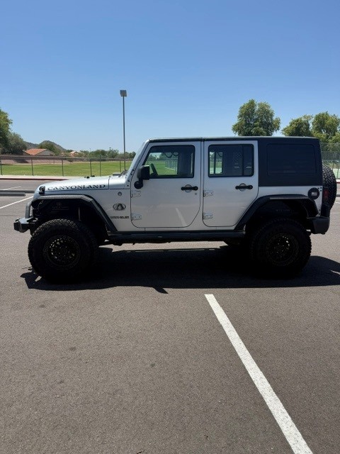 Used 2010 Jeep Wrangler Unlimited Sport w/ Trailer Tow Group AWD/4WD image 1