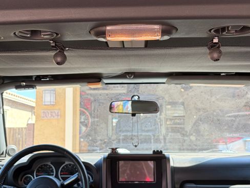 Used 2010 Jeep Wrangler Sahara w/ Dual Top Group AWD/4WD image 11