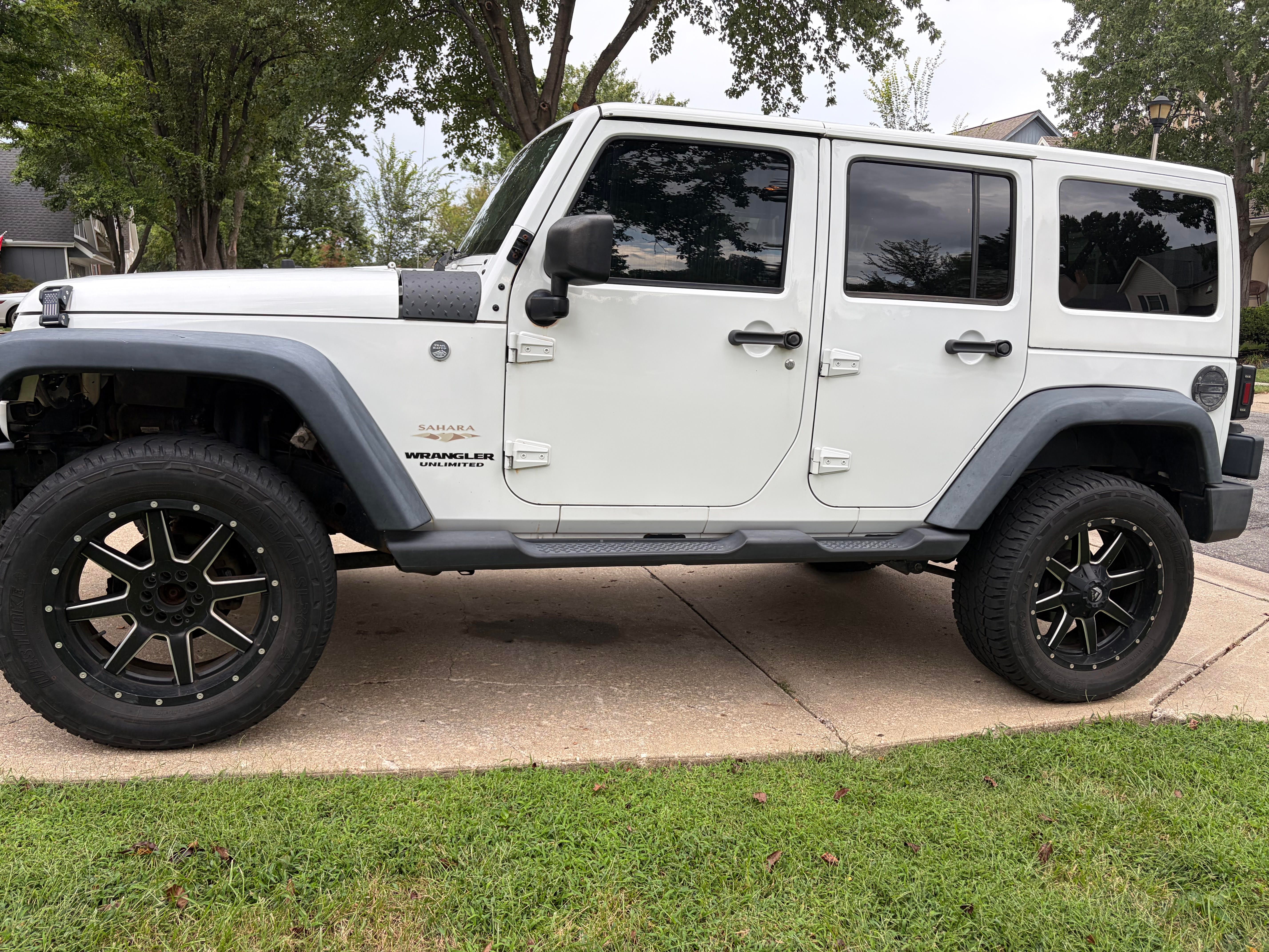 Used 2012 Jeep Wrangler Unlimited Sahara w/ Connectivity Group AWD/4WD image 1