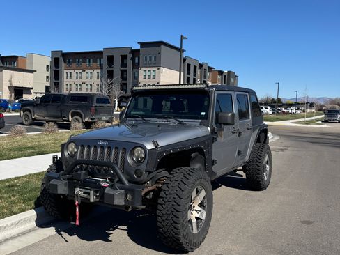 Used 2014 Jeep Wrangler Unlimited Sport image 1