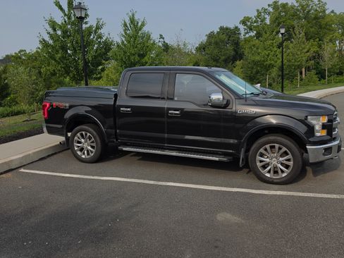Used 2015 Ford F150 Lariat AWD/4WD image 1