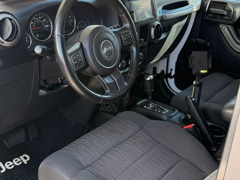 Used 2012 Jeep Wrangler Sport w/ Connectivity Group AWD/4WD image 6