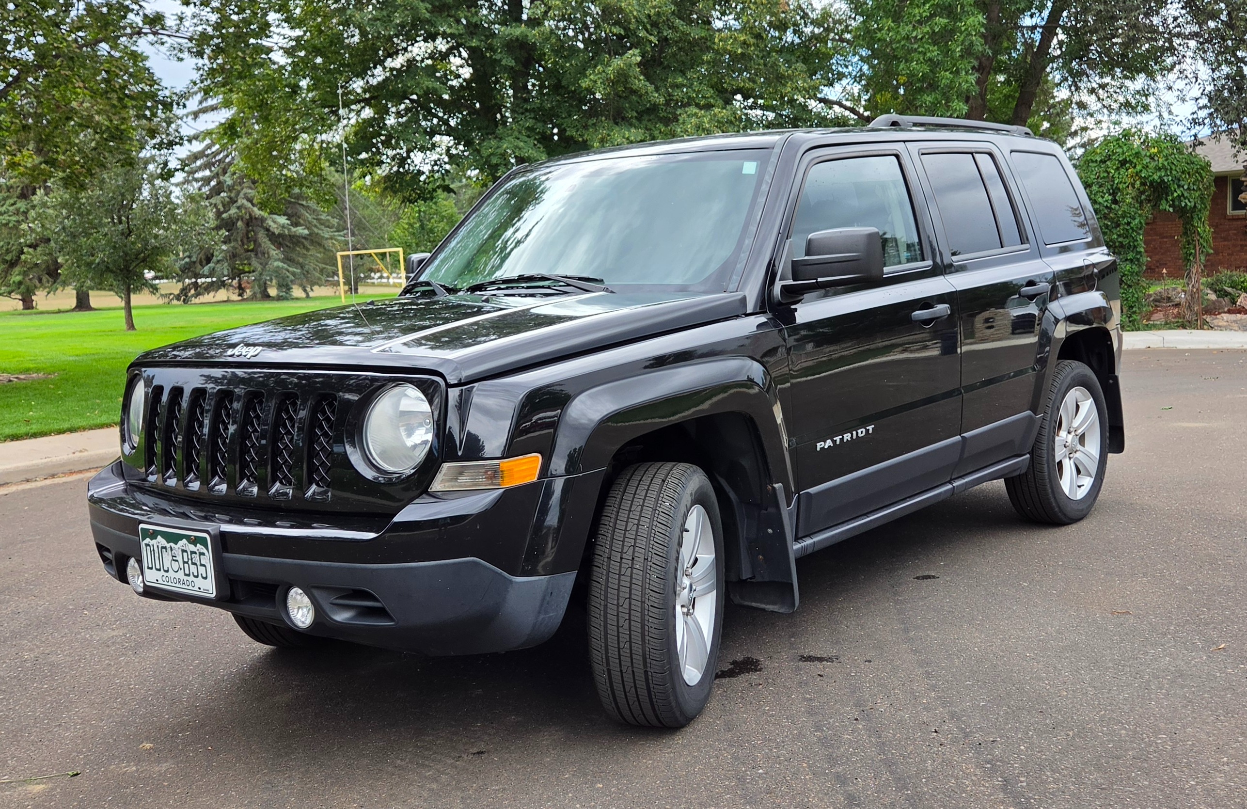 Used 2014 Jeep Patriot Sport w/ Tire & Wheel Group AWD/4WD image 1
