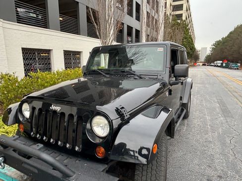 Used 2012 Jeep Wrangler Unlimited Sahara w/ Dual Top Group image 2