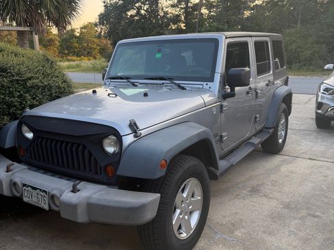 Used 2013 Jeep Wrangler Unlimited Sport image 1