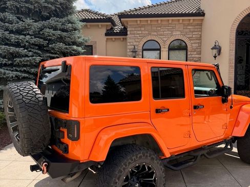 Used 2013 Jeep Wrangler Unlimited Sahara w/ Dual Top Group AWD/4WD image 4